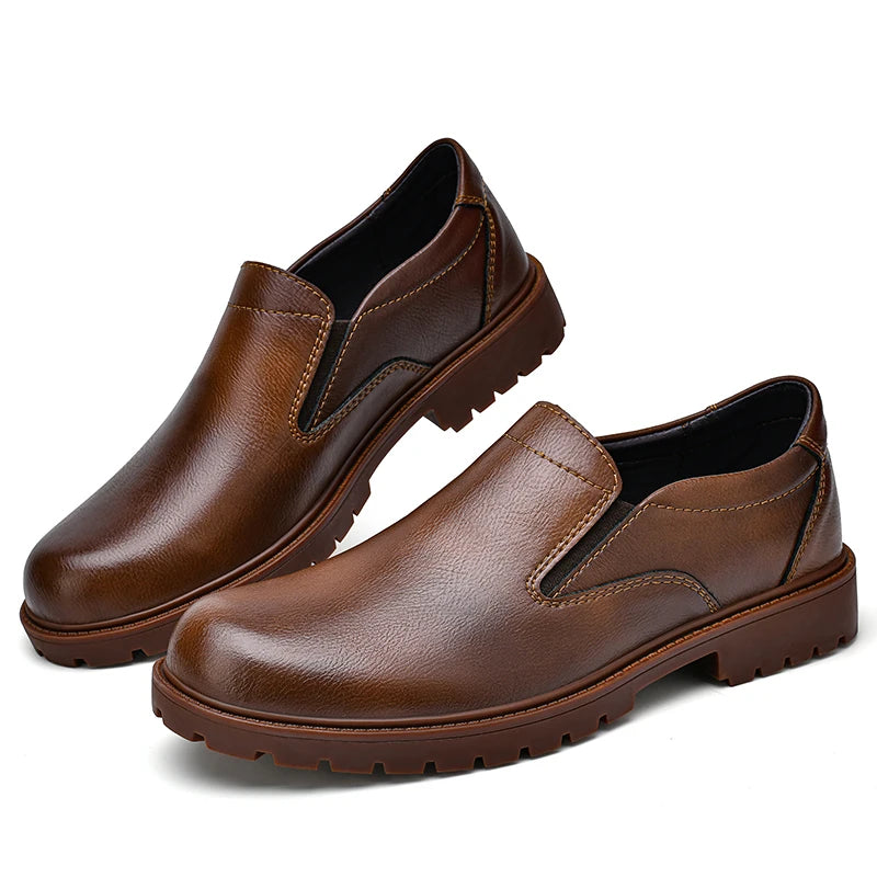 Black men's slip-on oxford loafers made of smooth leather, casual Italian shoes with a sleek, pure color design.