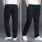 Plus size men's trousers from BACKUPMYFILESNOW® featuring a comfortable fit and classic design, shown in a neutral color.