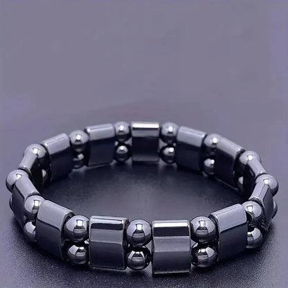 Black gallstone magnetic bracelet for men and women featuring double row beads with magnetic energy, stylish and adjustable.