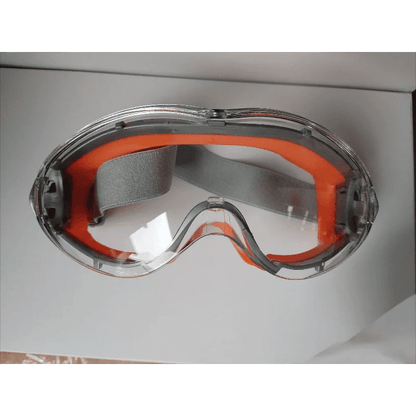 Black industrial safety goggles with anti-fog, anti-dust, anti-scratch lenses, impact-proof for cycling and mountaineering safety.
