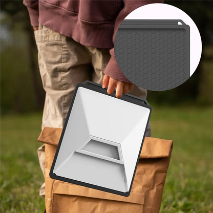 Black silicone protective cover with carabiner for Starlink Mini, providing full coverage and outdoor portability.
