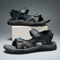 Black and blue men's summer beach sandals with breathable quick-drying material, flat bottom, and non-slip sole for comfortable walking.
