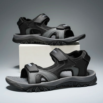 Black and blue men's summer water sandals with breathable, quick-drying materials, flat bottom, and non-slip soles for beach and driving.