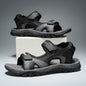 Black and blue men's summer sandals with breathable quick-dry material, flat bottom, non-slip soles, and driving shoe design.