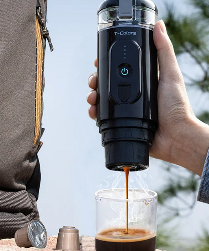 Black coffee maker from BackupMyFilesNow.com with a sleek design, brewing coffee in a modern kitchen setting.