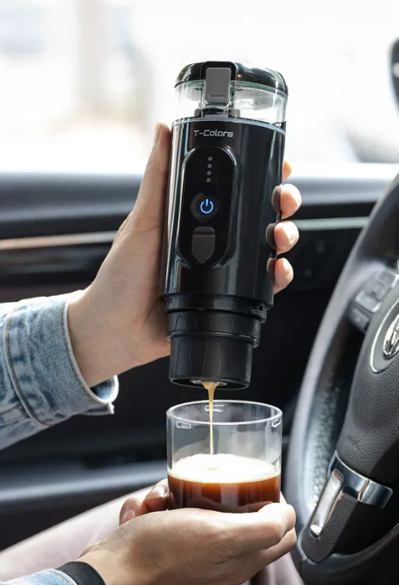 Black coffee maker from BackupMyFilesNow.com with a sleek design, featuring a glass carafe and digital control panel.