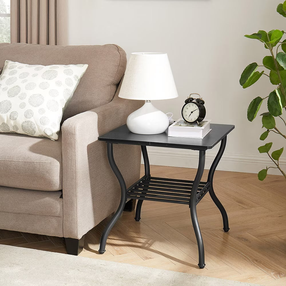Contemporary black 3-piece rectangular coffee table set with sleek modern design, featuring smooth surfaces and sturdy legs.