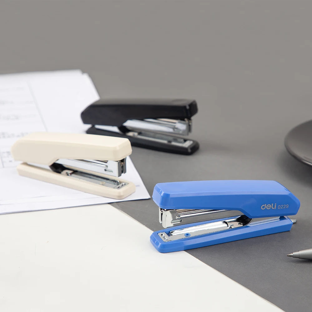 Black Deli Stapler 10 by BackupMyFilesNow.com, durable metal stapling machine for office paper binding and filing.