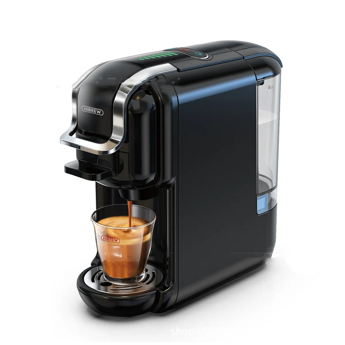 Black BACKUPMYFILESNOW.COM® espresso capsule coffee machine connected to a UK electrical outlet, for home use.