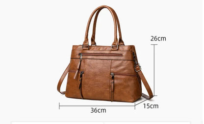 Elegant black women's handbag with top handle, shoulder strap, and casual tote style in high-quality PU leather.