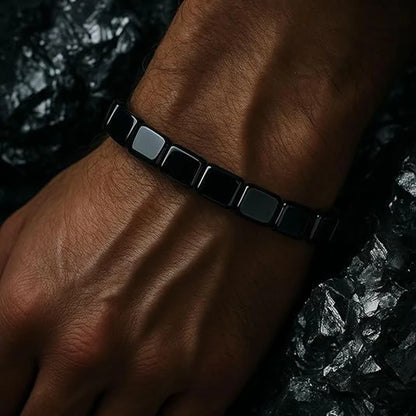 Black hematite bracelet for men featuring natural beaded stretch design, promoting confidence and healing jewelry style.