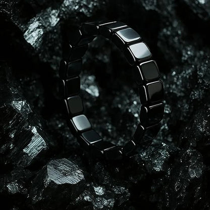 Black hematite men's bracelet with beaded stretch design, showcasing natural hematite stones for confidence and healing.