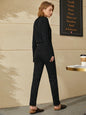 Black AMII Minimalism women's jeans, ankle-length slim casual trousers with slight stretch, suitable for winter wear.
