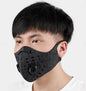 Black KN95 cycling mask by BackupMyFilesNow.com, featuring adjustable ear loops and breathable fabric for outdoor protection.