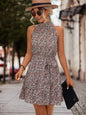 Floral sleeveless halter neck dress for ladies by BACKUPMYFILESNOW.COM®, showcasing a vibrant floral pattern and elegant design.
