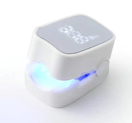 Black LED laser nail fungus device by BACKUPMYFILESNOW.COM® used to treat fungal infections on toenails and fingernails.
