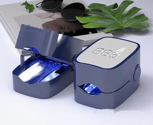 Black LED laser nail fungus device by BACKUPMYFILESNOW.COM® for fungal treatment, shown in a sleek handheld design.