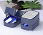 Black LED laser nail fungus device by BACKUPMYFILESNOW.COM® for fungal treatment, shown in a sleek handheld design.
