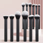 Black 12-piece professional makeup brush set with multifunctional cosmetic brushes for makeup application and blending.