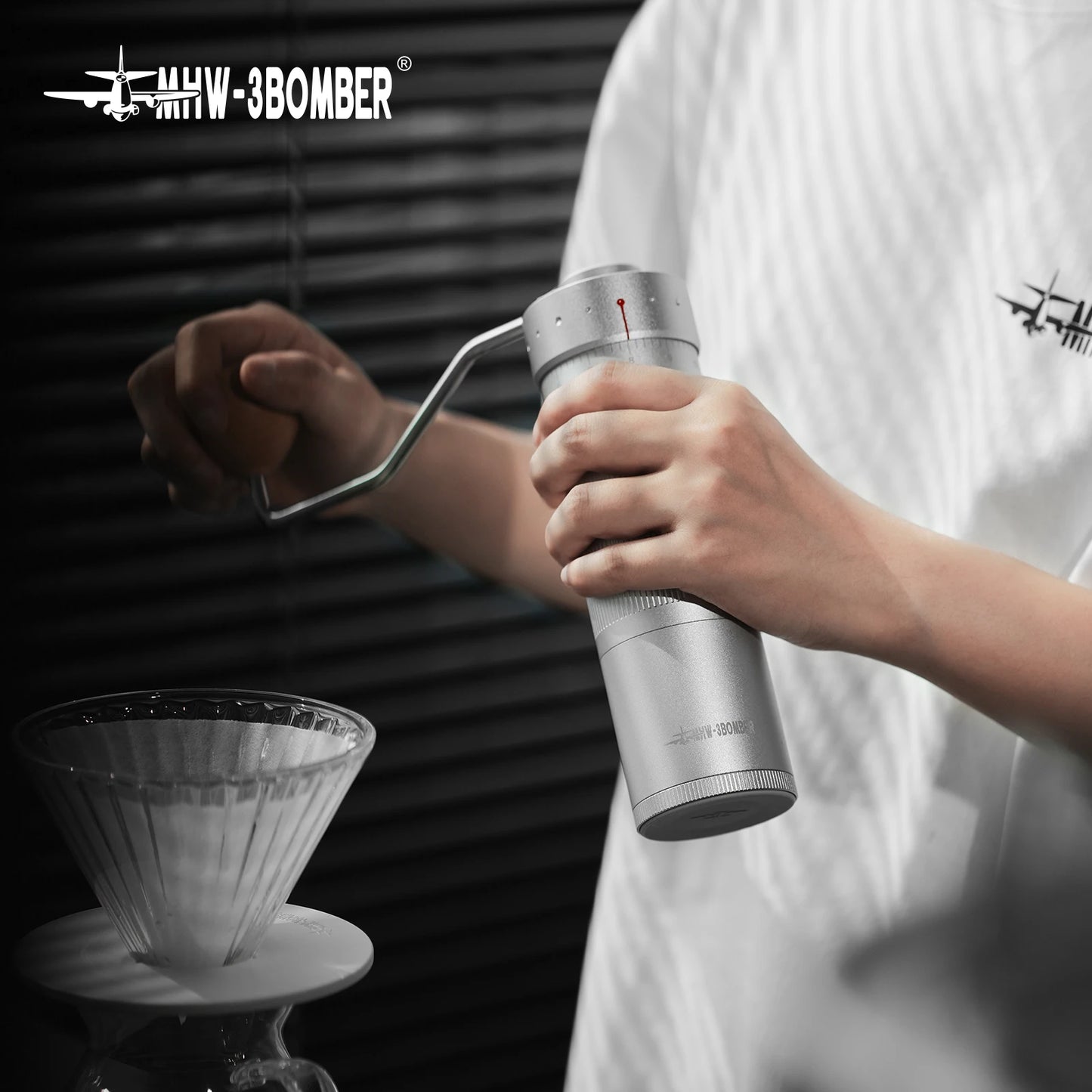Black MHW-3BOMBER Precision R3 Pro manual coffee grinder with externally adjustable settings, portable espresso grinding tool.