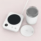 Black coffee mug warmer pad with electric heater, constant temperature control, suitable for home or office use.
