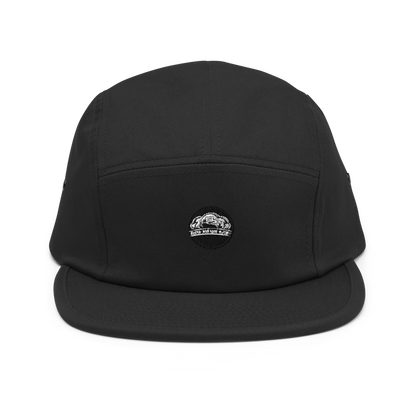 Black Yupoong 7005 5-panel cap with adjustable strap, featuring a classic six-panel design and structured front for a stylish look.
