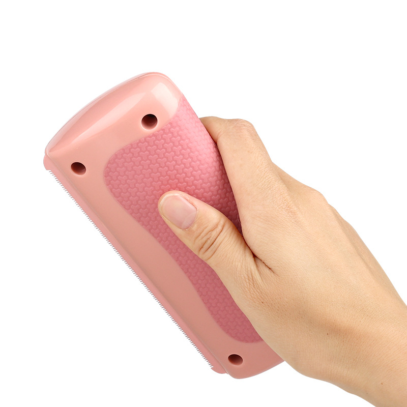 Black pet grooming comb from BackupMyFilesNow.com with fine and wide teeth for gentle pet hair detangling.