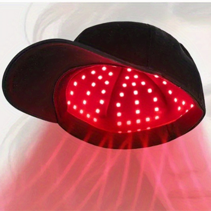 Red light therapy cap by BackupMyFilesNow.com with black and red design, featuring multiple LED light panels for scalp treatment.