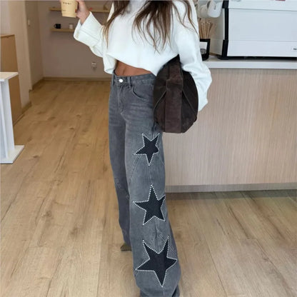 Black retro casual jeans for women featuring straight, loose fit, star patchwork, simple street style, ideal for summer and spring wear.
