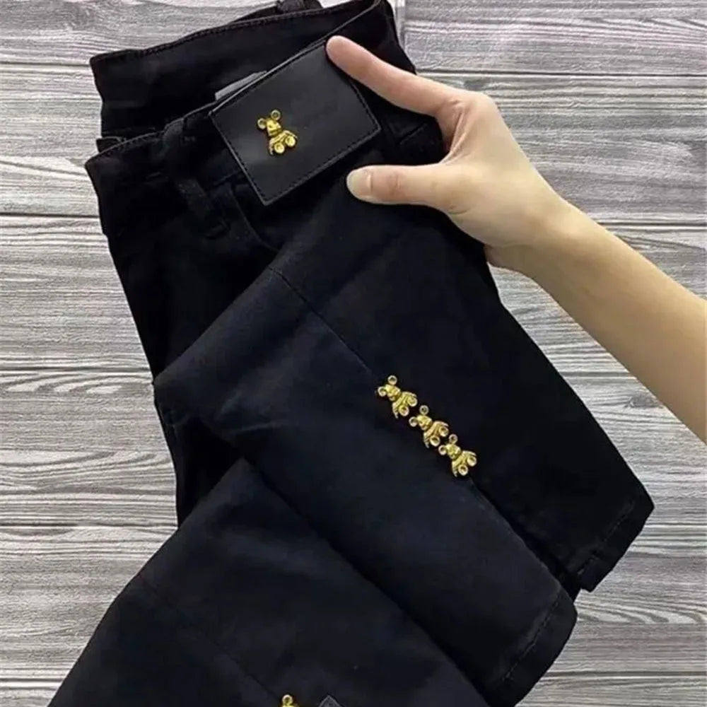 Black 2023 autumn loose chic denim trousers for women with wide leg, high waist, and split design, Korean style straight jeans.
