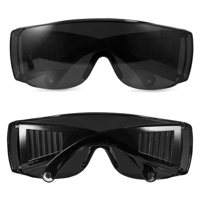 Black safety goggles with clear lenses, anti-splash and dust-proof eye protection for industrial and lab work.