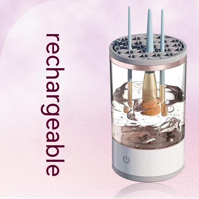 Black rechargeable makeup brush cleaner from BackupMyFilesNow.com, shown with brushes inside for cleaning and drying.