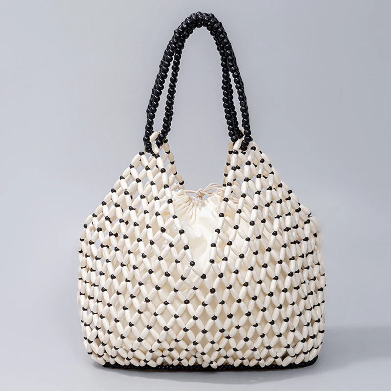 Black handwoven wooden bead handbag with retro style, versatile for summer vacations, featuring a water bucket design for women.
