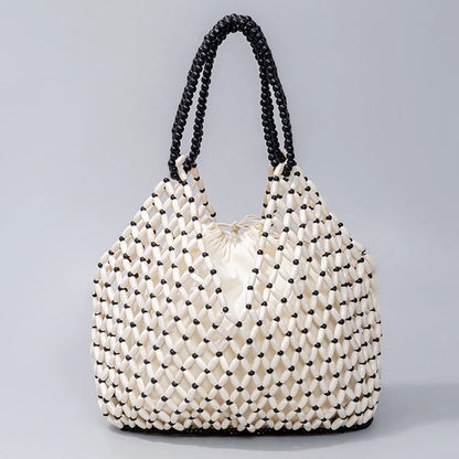 Black handwoven wooden bead handbag with retro style, versatile for summer vacations, featuring a water bucket design for women.