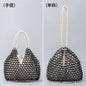 Black woven wooden bead handbag with retro design, versatile for summer vacation, featuring a handheld and shoulder bag style.