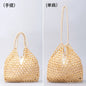 Black woven wooden bead handbag with retro design, versatile for summer vacations, featuring a water bucket style for women.