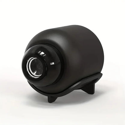 Black smart home security camera with night vision, motion detection, and remote wireless monitoring for video surveillance.