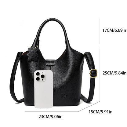 Black soft leather women's vintage shoulder handbag with large capacity and luxury designer style, featuring a classic elegant design.