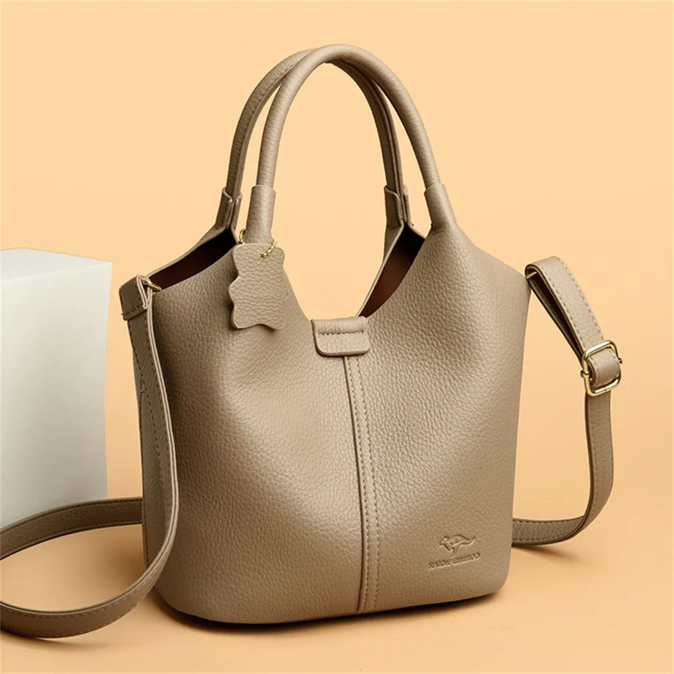 Black soft leather vintage women's shoulder handbag with large capacity and luxury designer style.