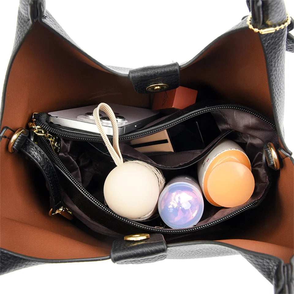 Black soft leather handbag for women, vintage luxury designer shoulder bag with large capacity and elegant style.