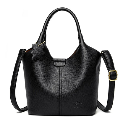 Black soft leather handbag for women featuring a vintage shoulder design, spacious interior, luxury style, and elegant craftsmanship.
