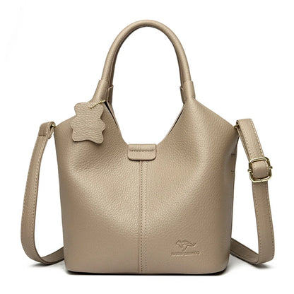 Black soft leather women's vintage shoulder handbag with large capacity, luxury designer style and elegant silhouette.