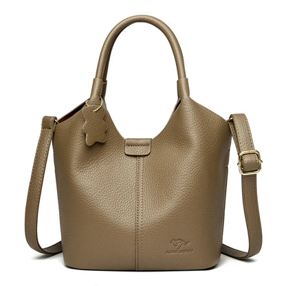 Black soft leather women's handbag featuring vintage design, large capacity, luxury style, with shoulder strap and elegant craftsmanship.
