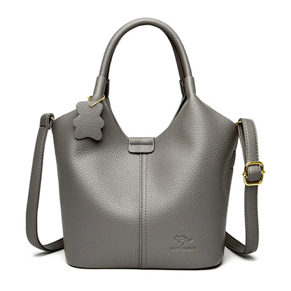 Black soft leather women's vintage shoulder handbag with large capacity, luxury designer style, and elegant shoulder strap.