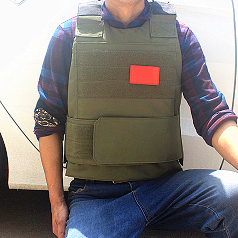 Black tactical outdoor vest from BACKUPMYFILESNOW.COM® with multiple pockets and adjustable straps, designed for outdoor activities.