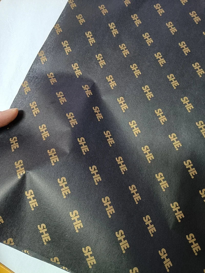 Black custom tissue paper with logo, 50x70cm, 250 sheets, ideal for gift wrapping and personalized packaging.