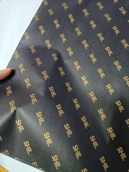 Black custom tissue paper with logo, 50x70cm, 250 sheets, ideal for gift wrapping and personalized packaging.
