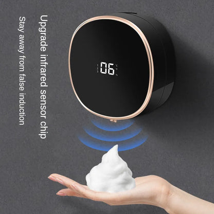 Black touchless automatic hand soap dispenser with infrared sensor, foam dispensing, and digital temperature display.