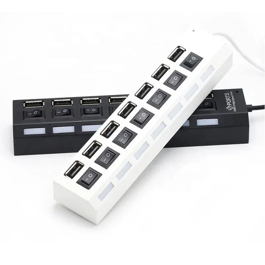 Black 7-port USB hub with on/off switch for PC, laptop, or MacBook, expanding USB connectivity with power adapter and multiple ports.