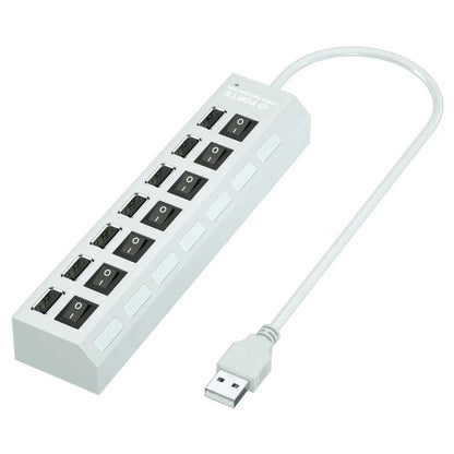 Black 7-port USB hub by BackupMyFilesNow.com, multi-USB splitter with on/off switches for PC, laptop, and MacBook accessories.